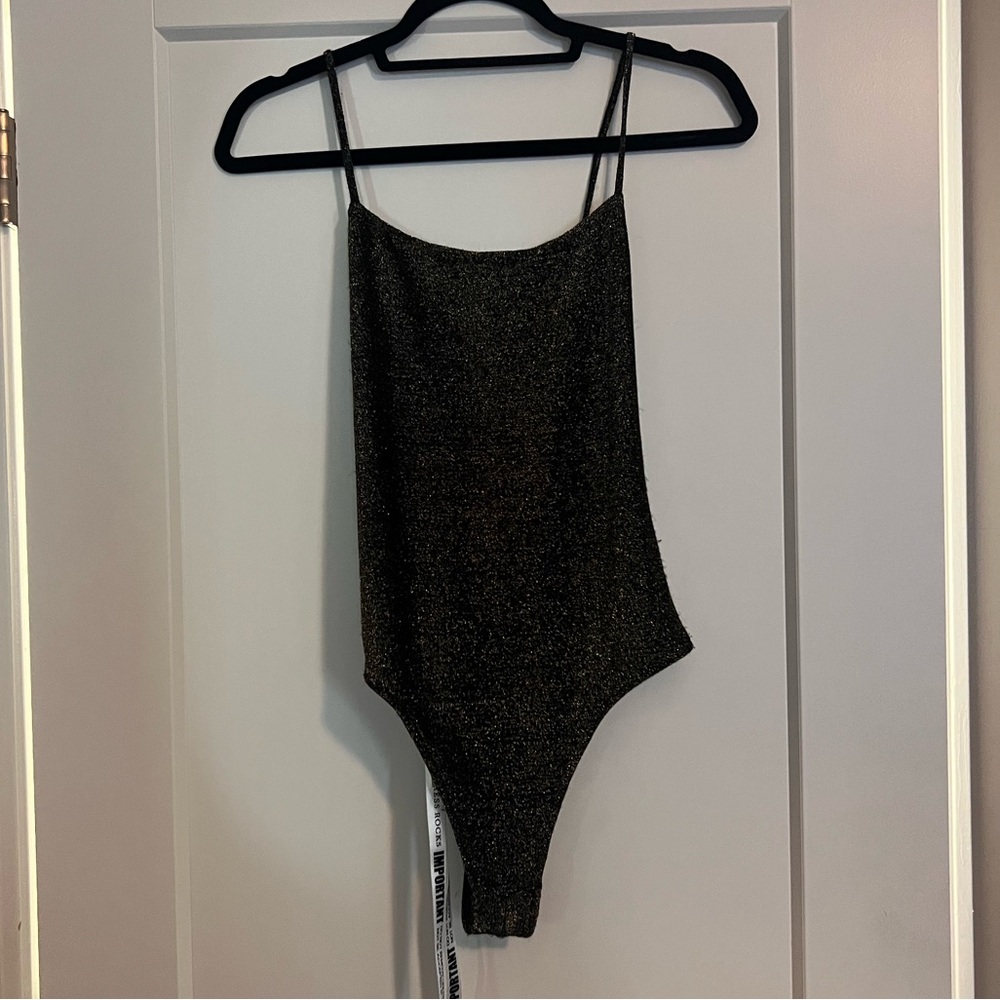 Brand new Mistress rocks gold black bodysuit